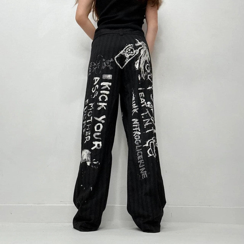 black pinstripe graphic text trousers