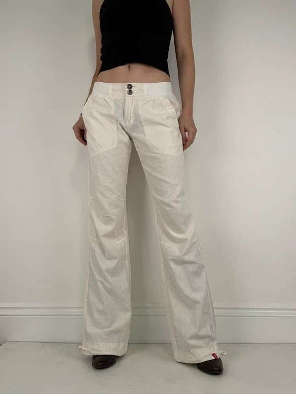 White low rise wide leg flared linen trousers
