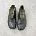 Black leather camper ballet flats