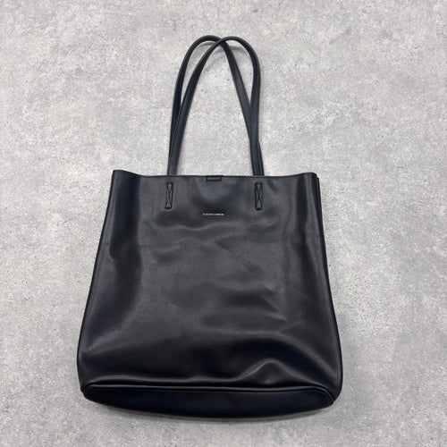 black faux leather tote bag