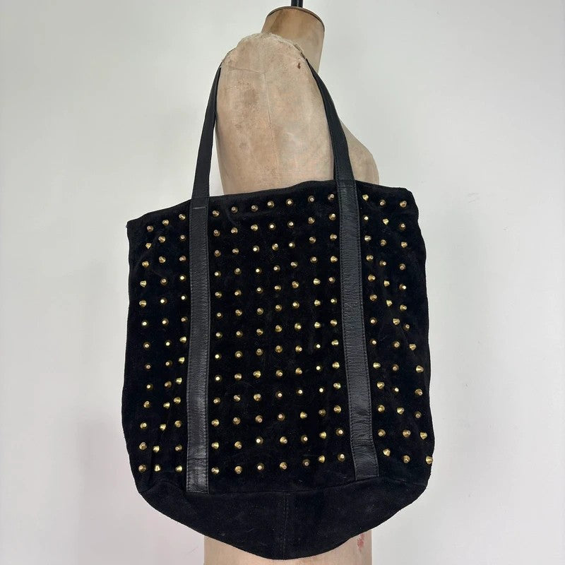Black suede tote bag with gold studded spikes
