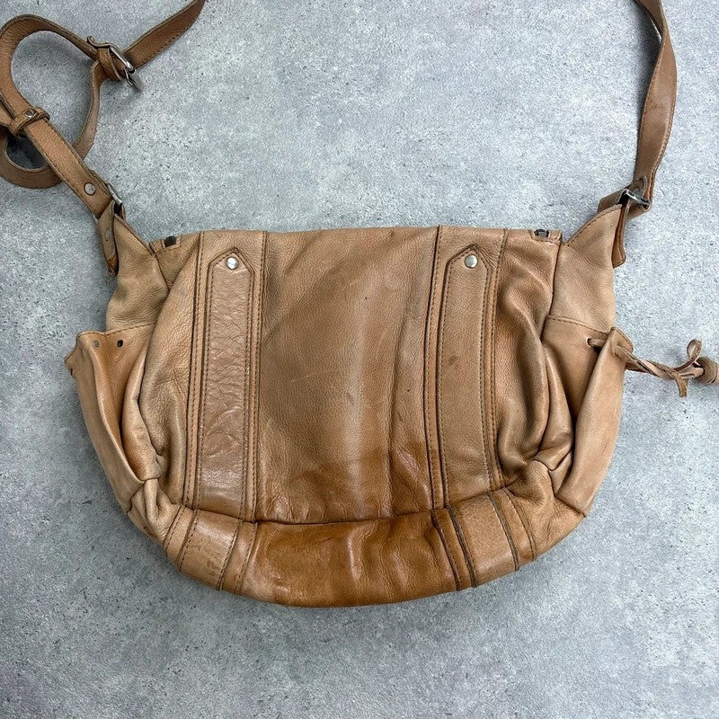 Tan distressed leather zip city crossbody D-ring bag