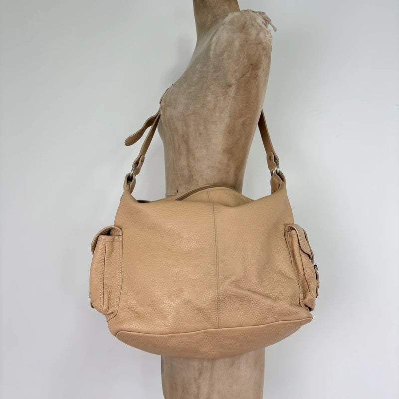 Slouchy cream leather cargo pocket satchel bag