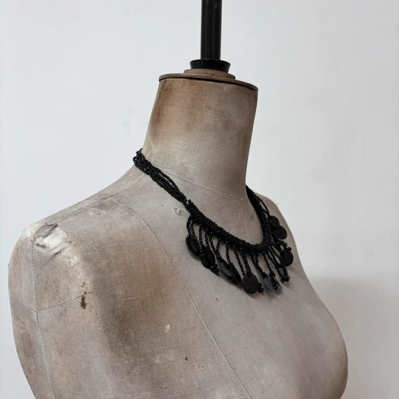 black beaded drape