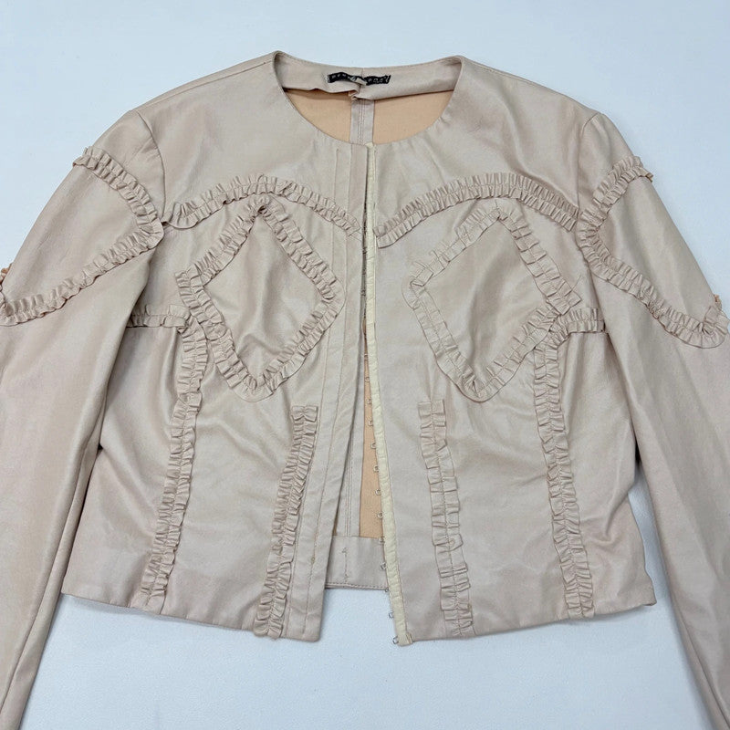 cropped hook and eye corset style jacket