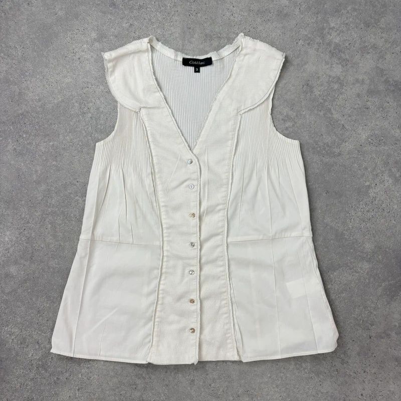 white cotton pleated blouse