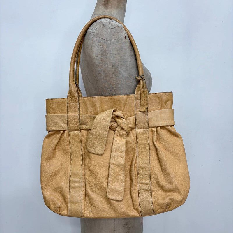 tan leather slouchy bow shoulder bag