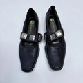 black pointed studded ballet flats