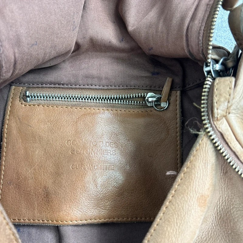 Tan distressed leather zip city crossbody D-ring bag