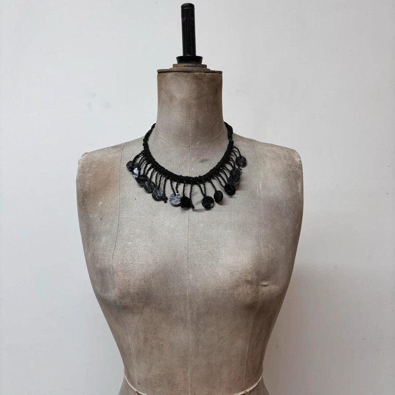 black beaded drape