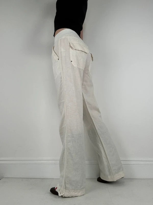 White low rise wide leg flared linen trousers