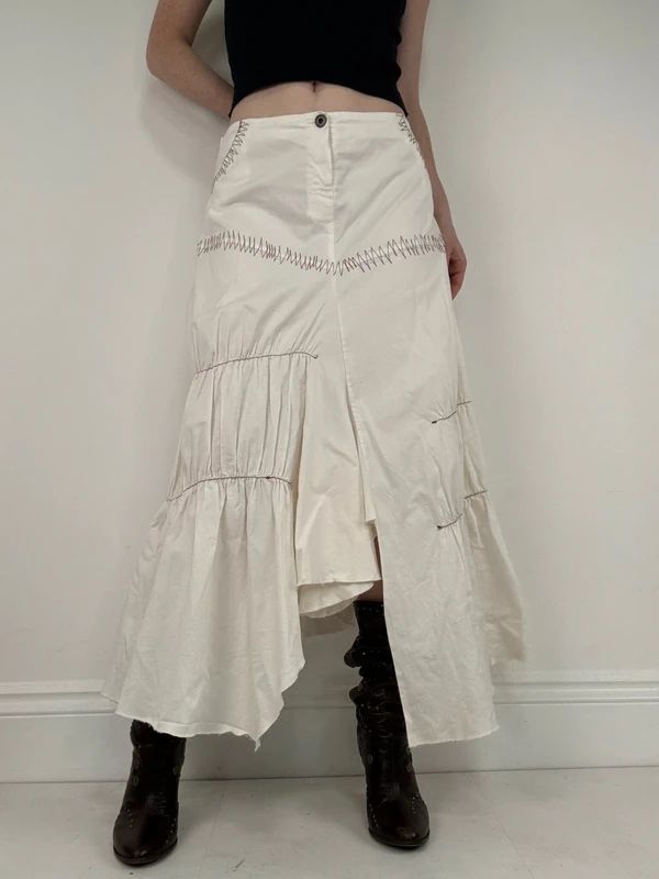 pleated white asymmetric flared maxi skirt