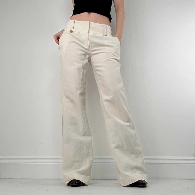 white flared wide leg thick waistband trousers