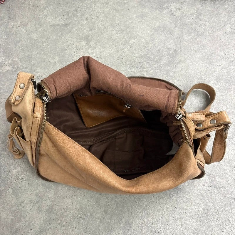 Tan distressed leather zip city crossbody D-ring bag