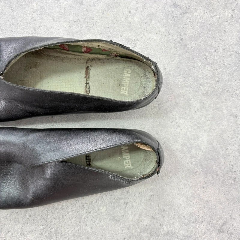 Black leather camper ballet flats