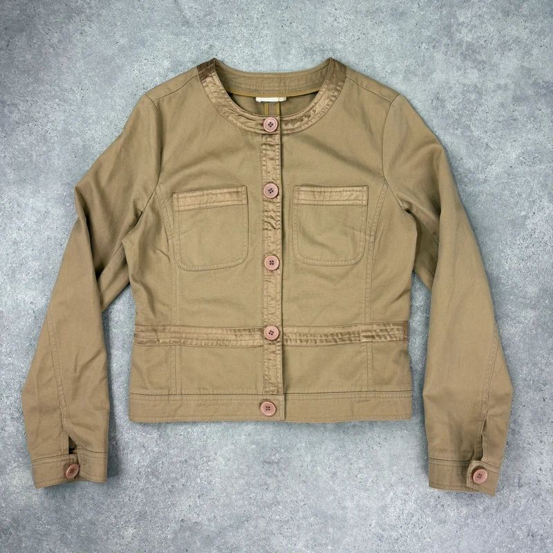 tan boxy cropped fit jacket with exposed button detail