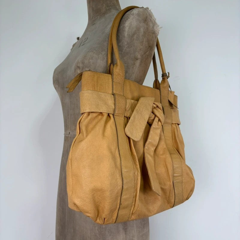 Cream yellow leather knot pleated handbag