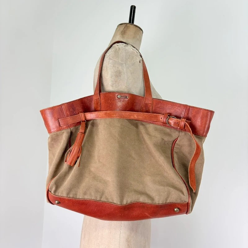 Slouchy oversized leather and canvas shoulder bag