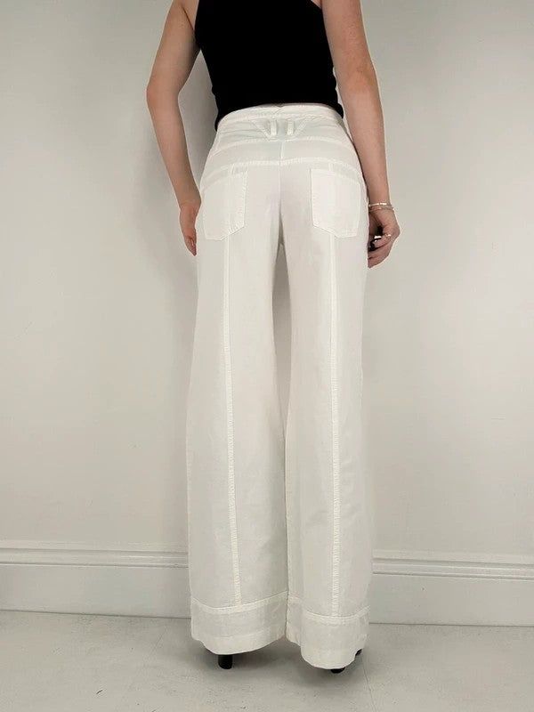 white flared wide leg button front cotton trousers