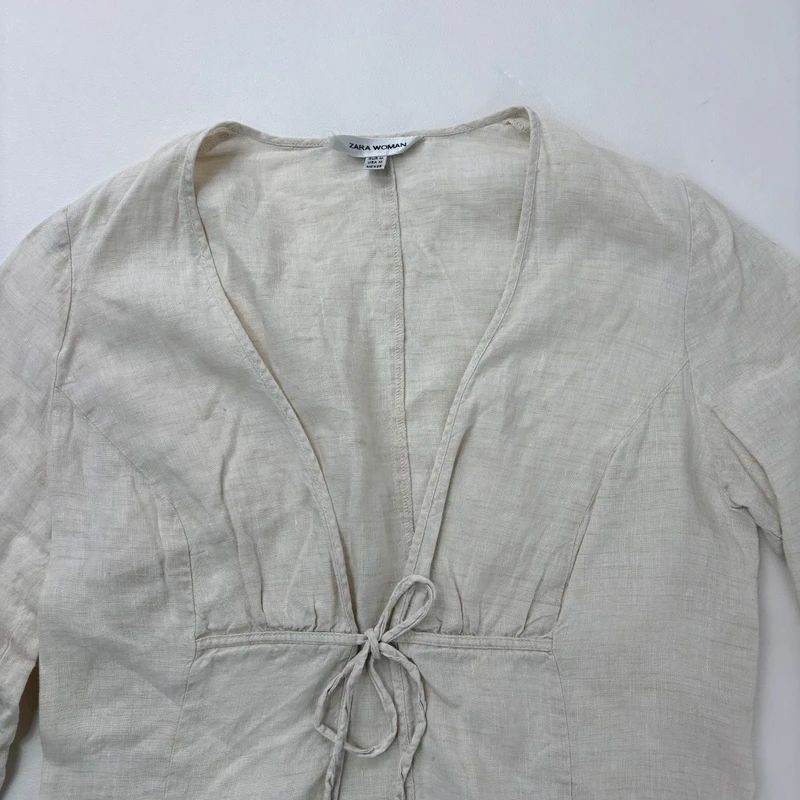 cream linen flared tie up shirt