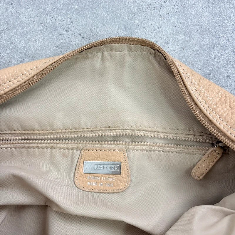 Slouchy cream leather cargo pocket satchel bag