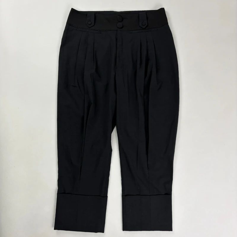 pleated black tailored trousers