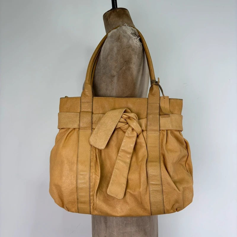 Cream yellow leather knot pleated handbag