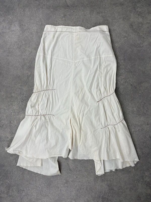pleated white asymmetric flared maxi skirt