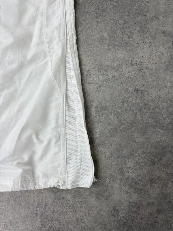 low rise white Reebok tracksuit bottoms