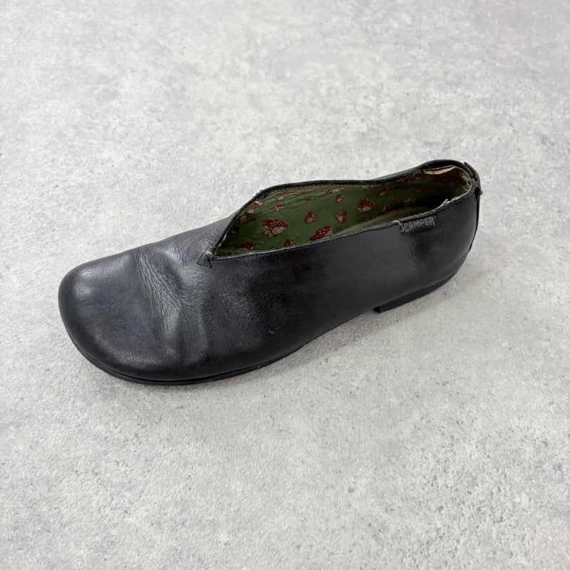Black leather camper ballet flats