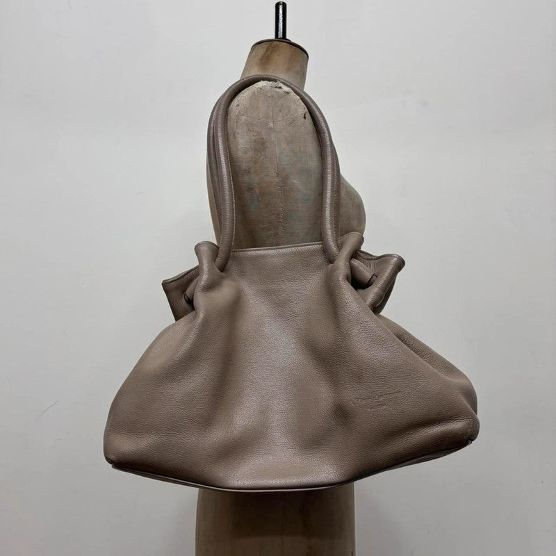 chunky oversized tan leather shoulder bag