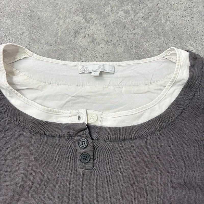 flared white shirt layered long sleeve top