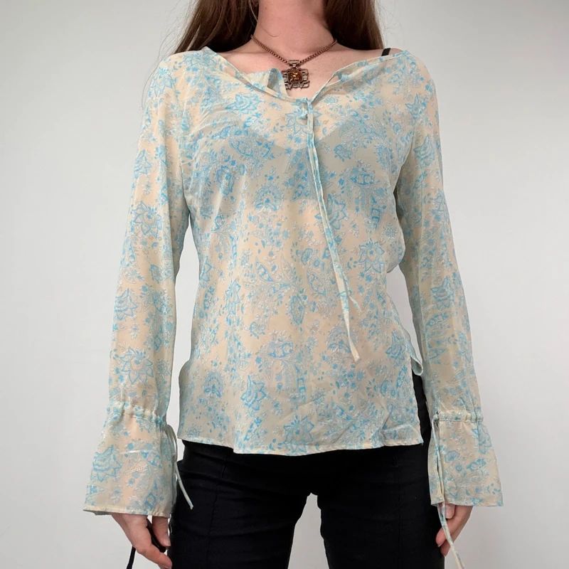 sheer floral flutter ETAM blouse with flare cuffs