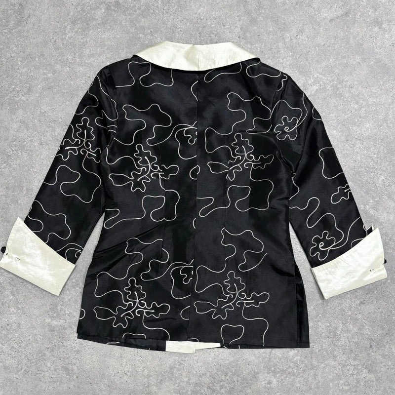 flared emboidered silk jacket