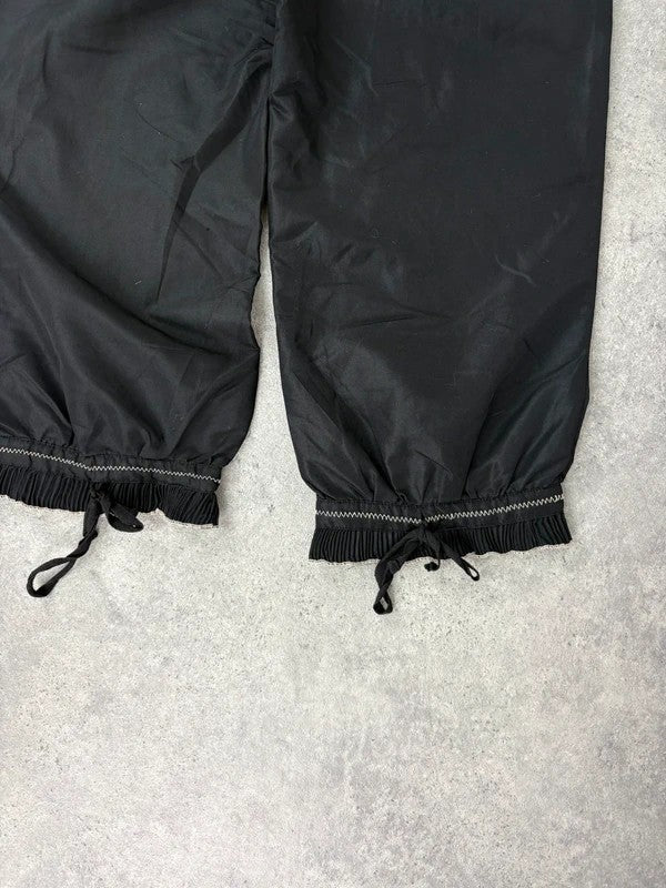 black capri pants pleated ruffle hem trousers