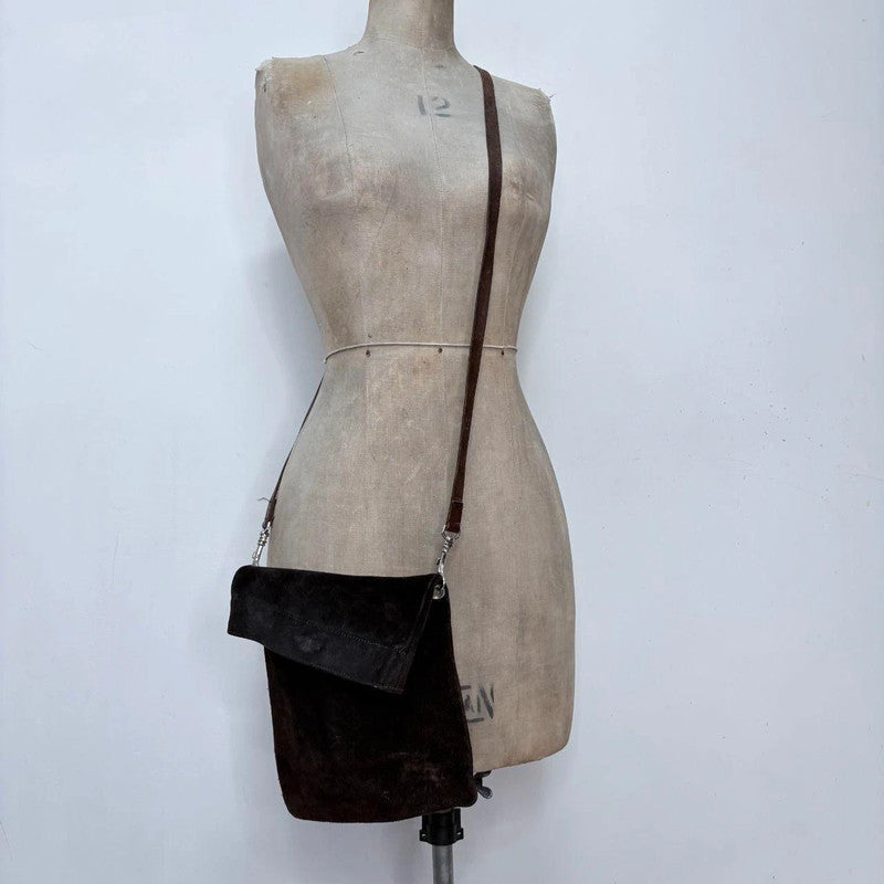 dark brown suede asymmetric fold over crossbody bag