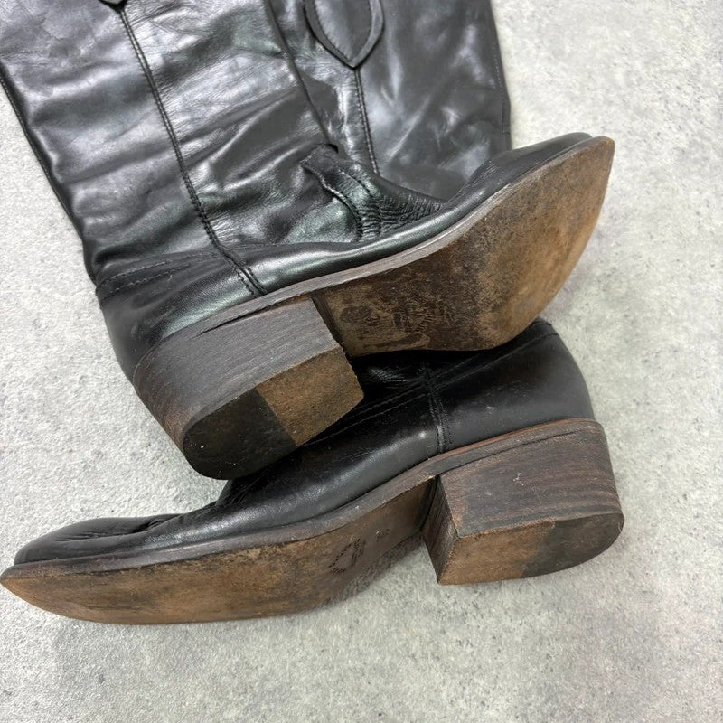 Black leather pointed toe boots