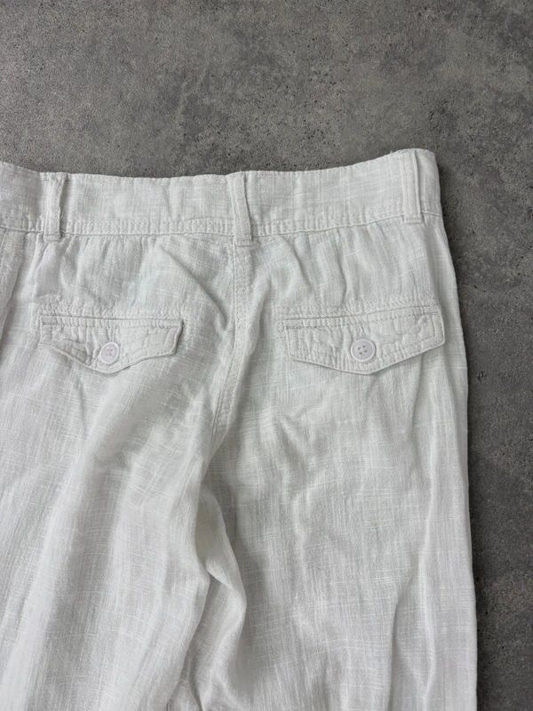white linen wide leg low rise trousers