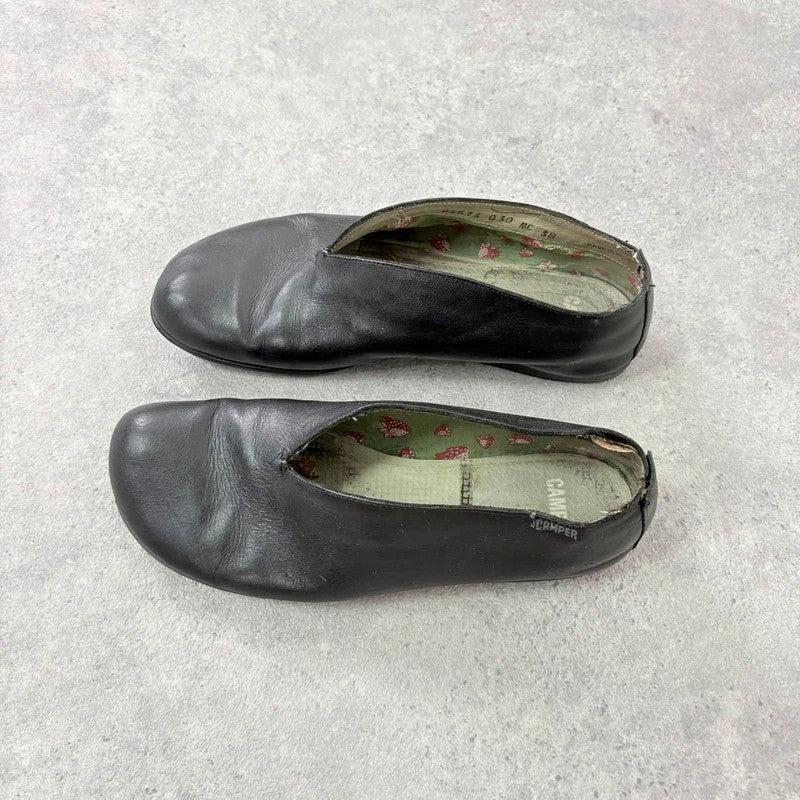 Black leather camper ballet flats