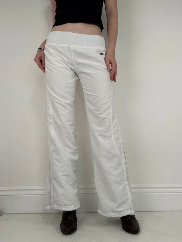 low rise white Reebok tracksuit bottoms