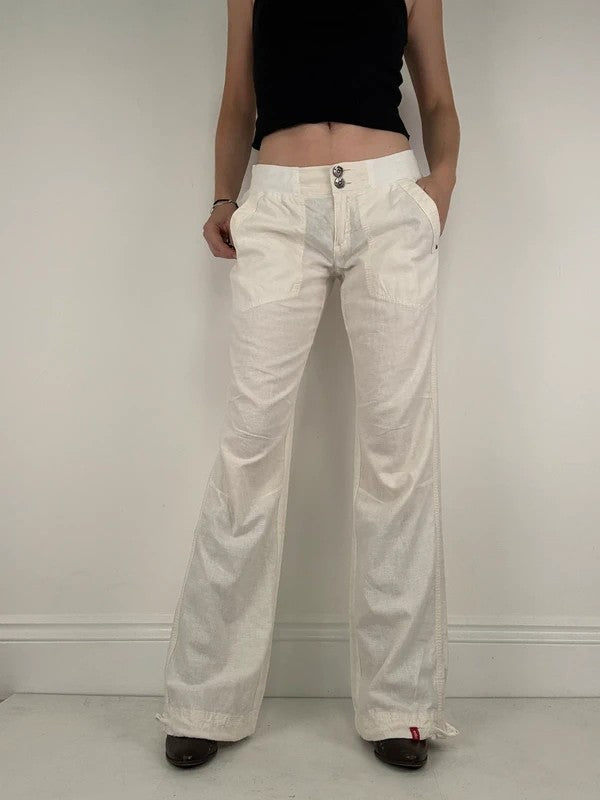 White low rise wide leg flared linen trousers