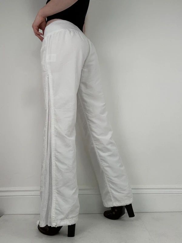 low rise white Reebok tracksuit bottoms