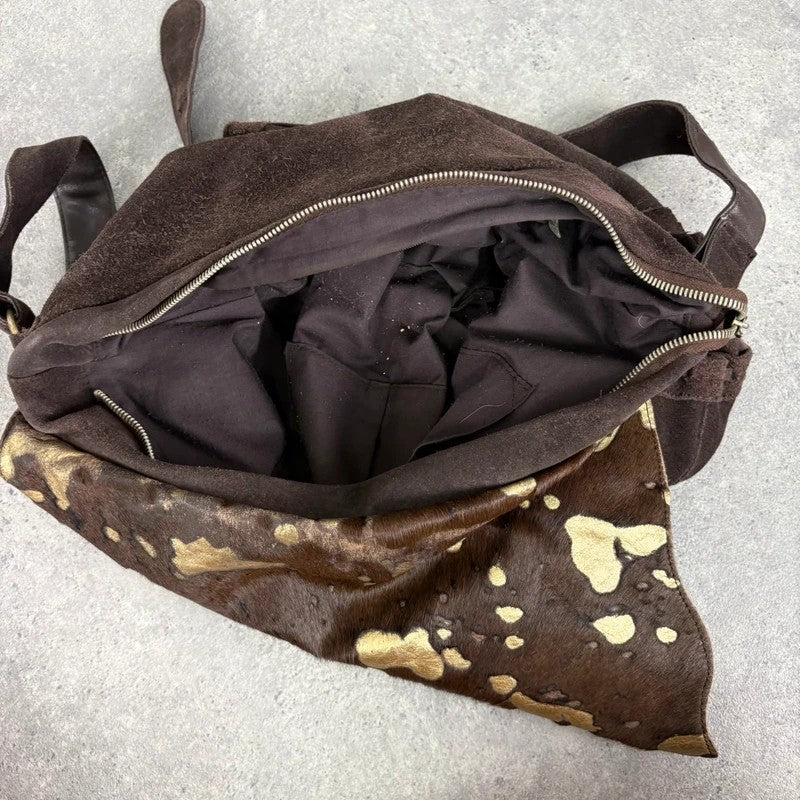 Brown cow hide leather satchel bag with gold embellishment