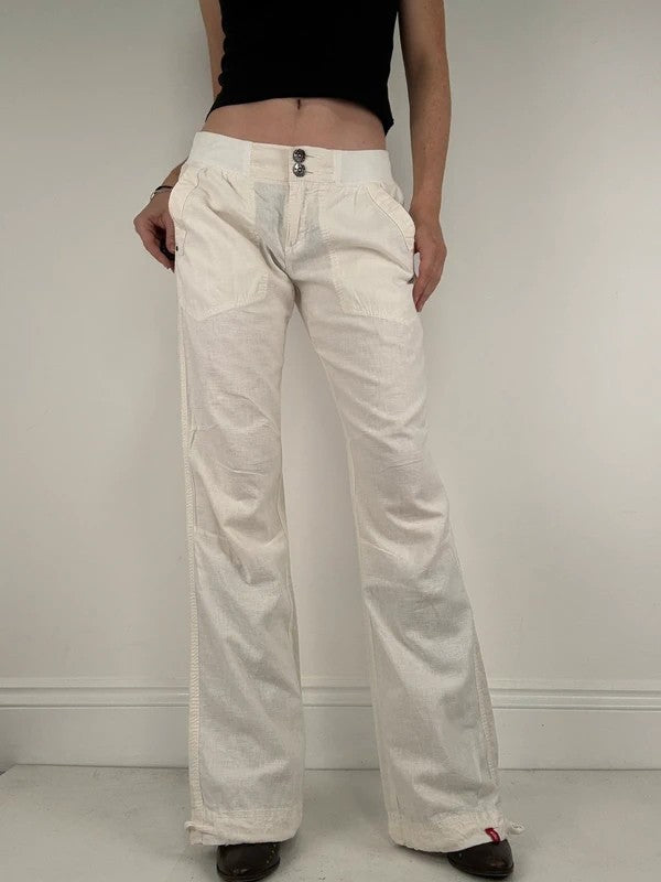 White low rise wide leg flared linen trousers