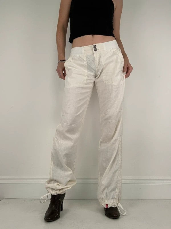 White low rise wide leg flared linen trousers
