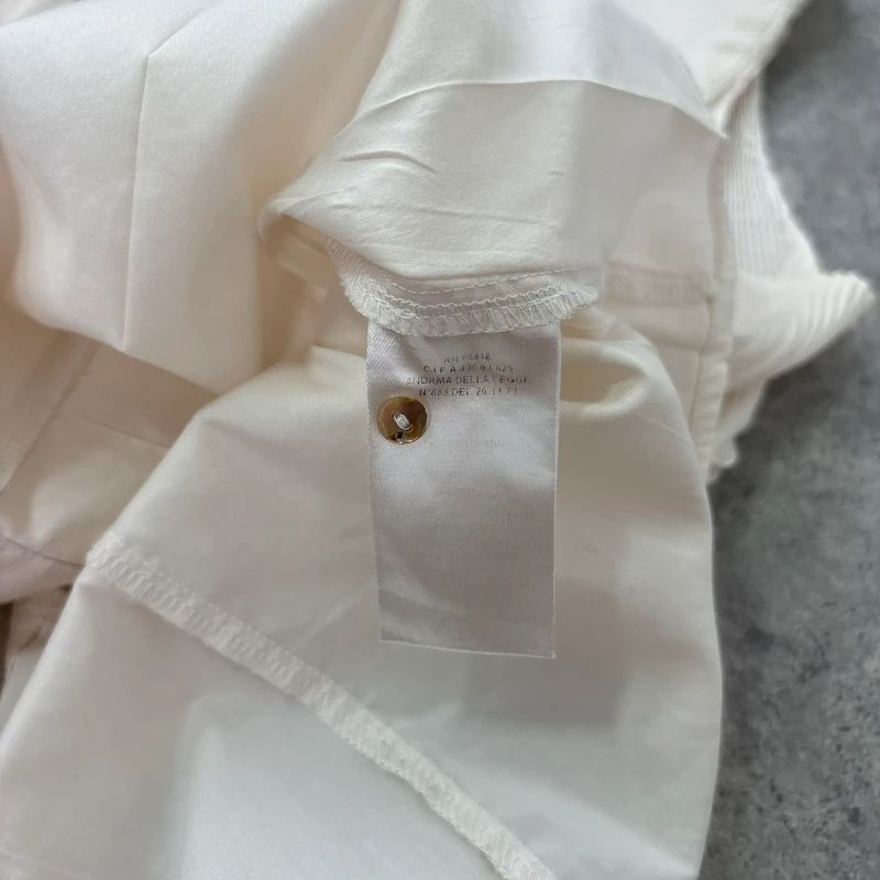 white cotton pleated blouse