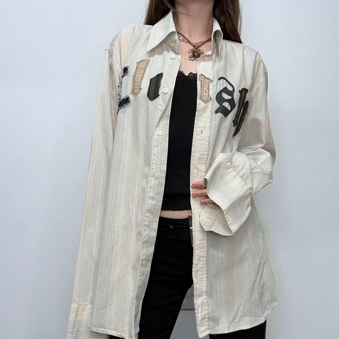 Pinstriped flared graphic shirt