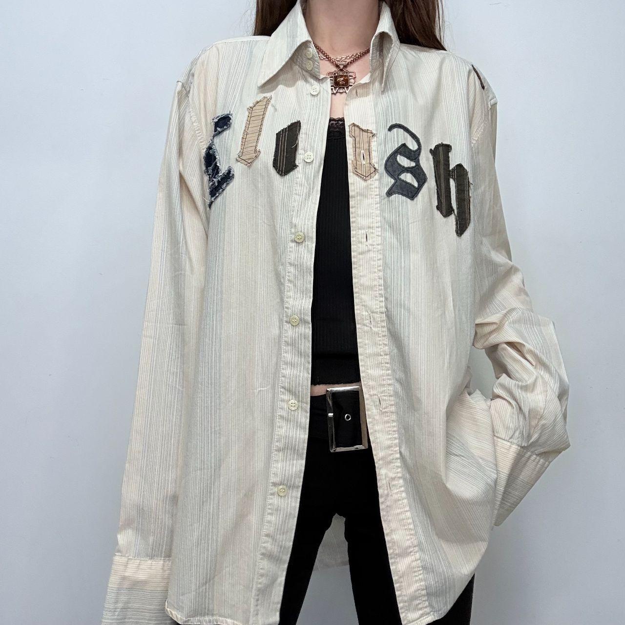 Pinstriped flared graphic shirt