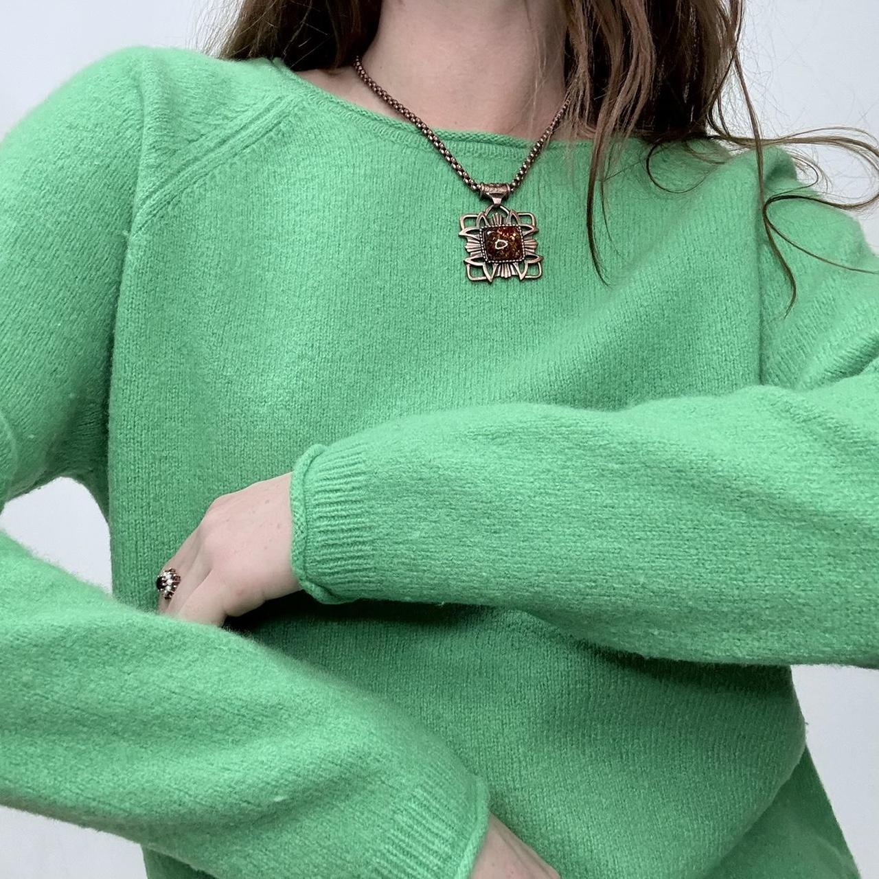 Green wool knitted jumper