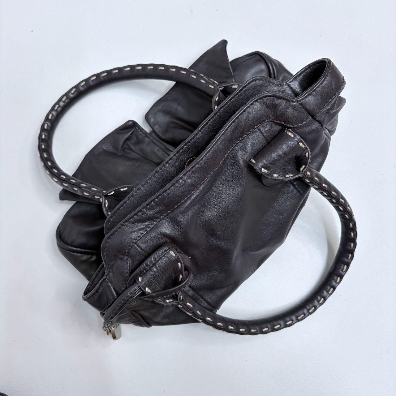 Brown leather bow bag
